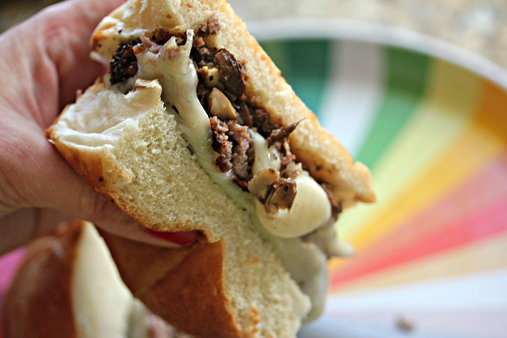 Pepper-Crusted Burgers Filled with Roasted Mushrooms and Swiss Cheese