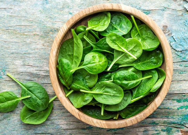 Bowl of fresh spinach.