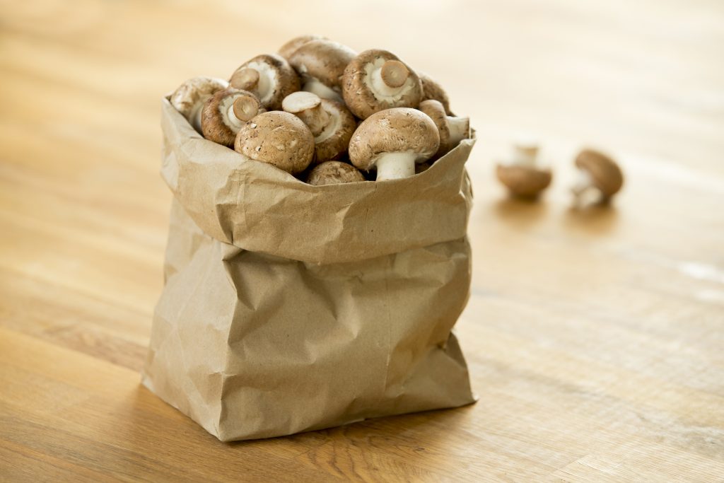 Mushrooms stored in a paper bag